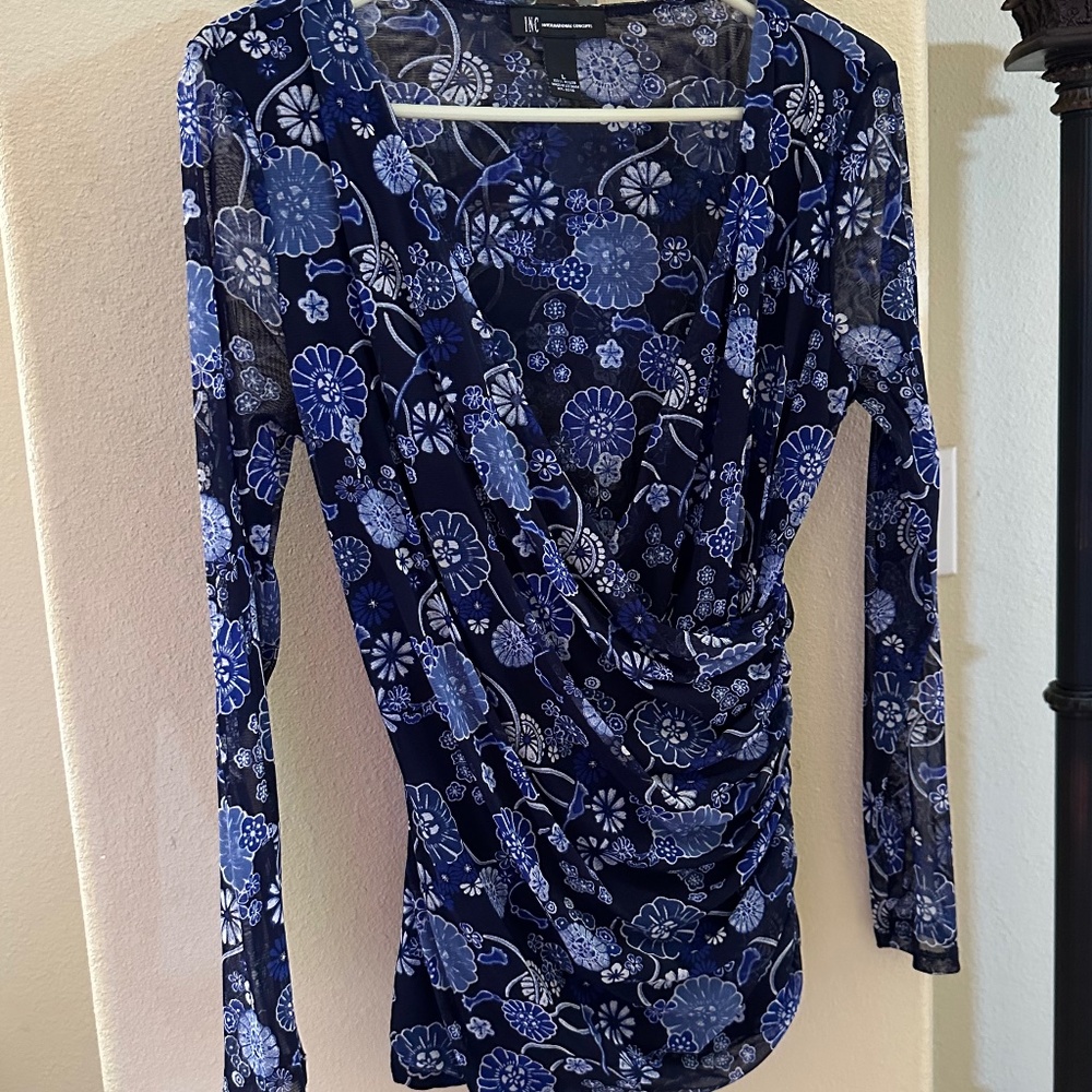 Draped blue and black blouse
